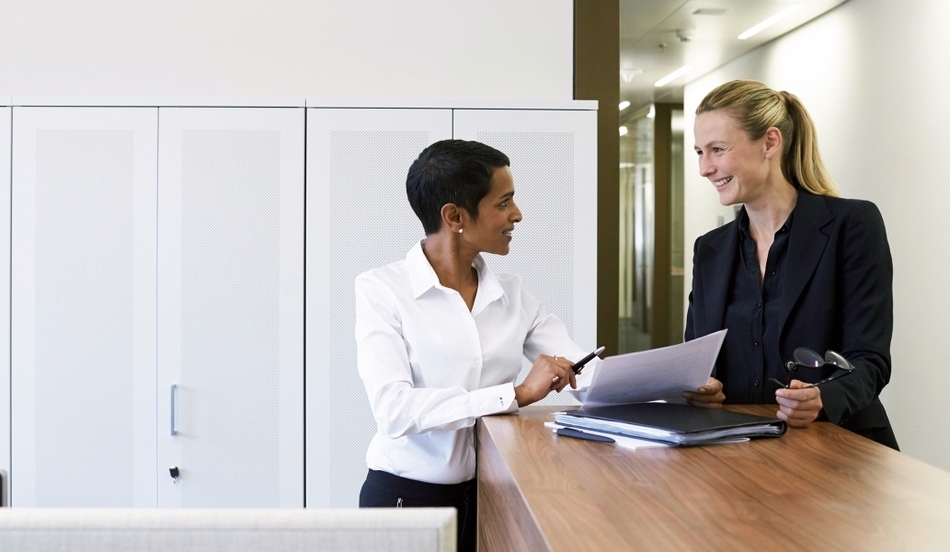 Two women in office